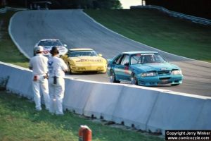 Battered but in front of Corvettes—at least at the moment—this scene summarizes the Baer Racing experience. The Mustang sure looks like a taxicab compared to the low and wide ‘vettes. Typical of Chevy racing, the plastic bowties were “super low and wide, not like a production Corvette at all,” according to Hal Baer.